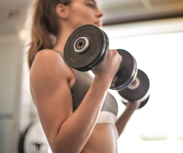 Member training with dumbbells